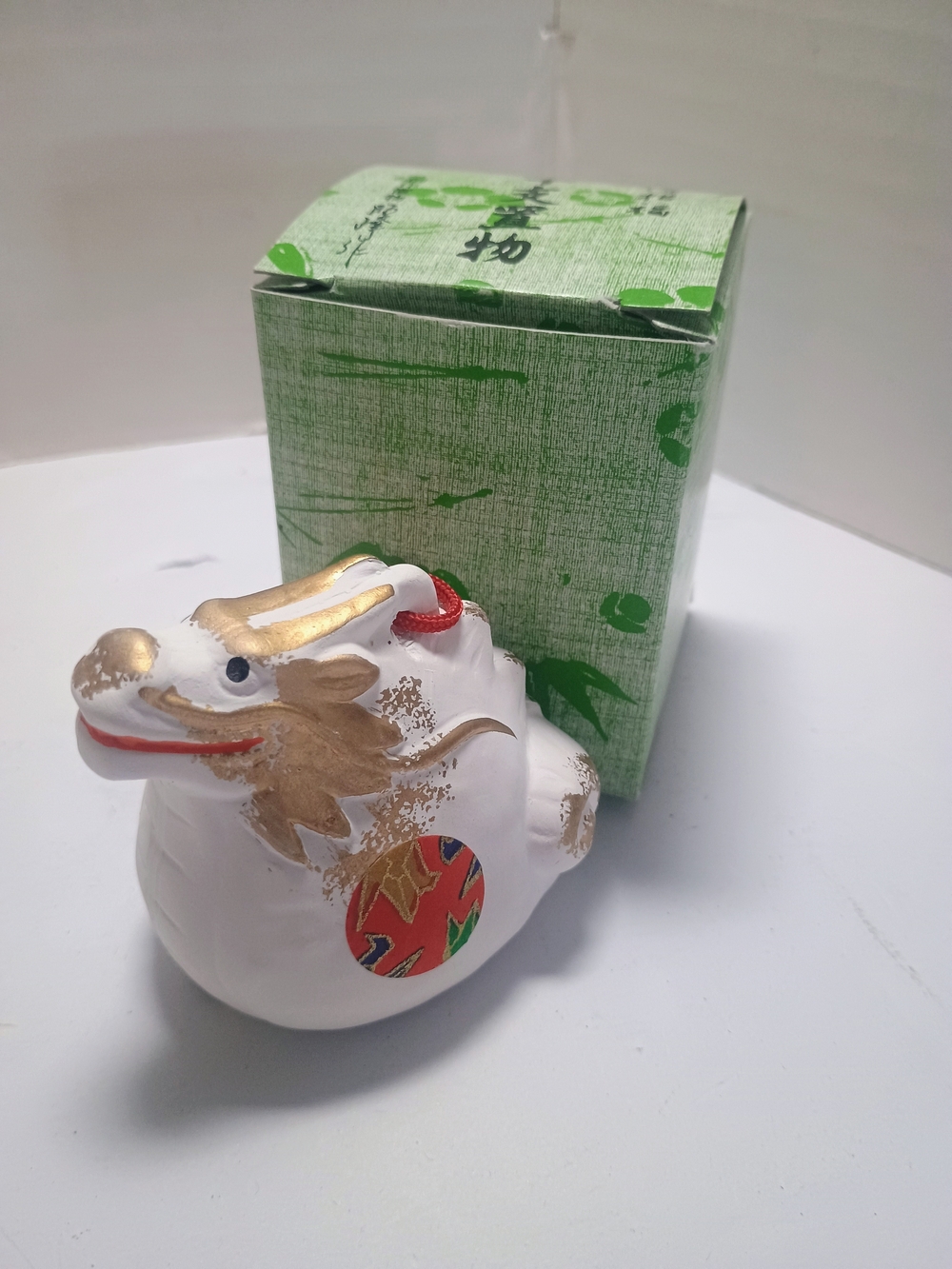 Source Unknown White Ceramic Dragon Figurine with Gold Accents and Red Detail